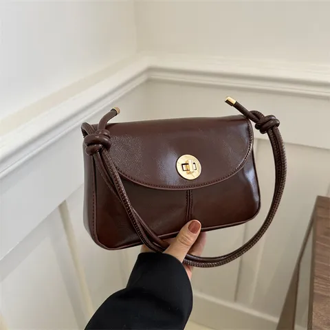 Damen Retro Einfarbig PU Leder Kleine Quadratische Tasche Vintage Crossbody Umhängetasche Mit Metall Drehverschluss Und Geknotetem Riemen