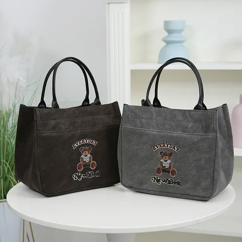 Women Canvas PU Leather Tote Bag Large Capacity Casual Commuter Handbag With Cute Bear Embroidery And Front Pocket