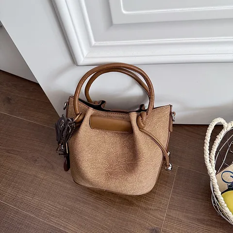 Fashion French Bucket Bag For Women PU Leather Stitching Patchwork Crossbody Shoulder Bag With Tassel Charm Elegant Daily Handbag
