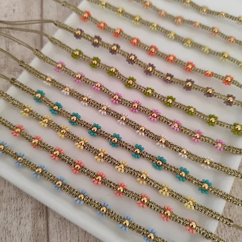 Braccialetto di Perline a Forma di Margherita Intrecciato a Mano Bohemien Braccialetto dell'Amicizia con Coulisse Regolabile per Donna Gioielli in Stile Vintage Ins