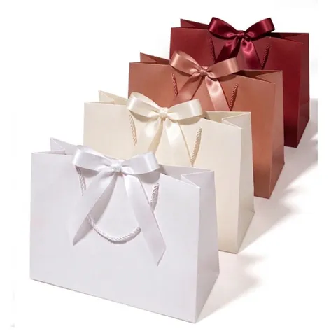 Sac en Papier de Carton Blanc Exquis Avec Nœud en Ruban Fond Carré Sac Cadeau Portatif Pour Vêtements Shopping Mariage Fête Paquet