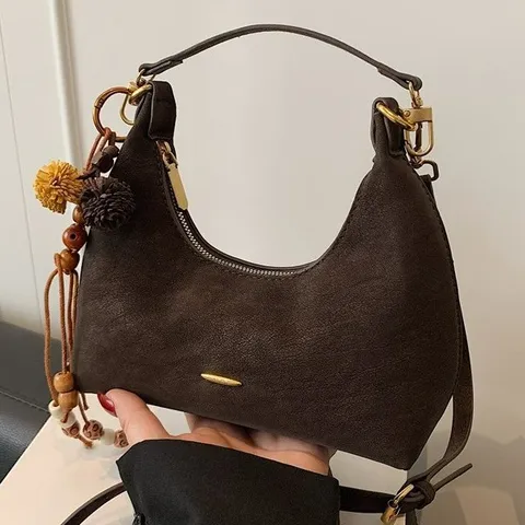 Vintage Matte PU Leren Hobo Tas Vrouwen Niche Ontwerp Halvemaan Schoudertas Met Bohemien Kwastje Hanger Crossbodytas