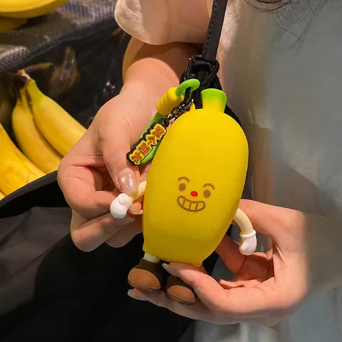 Mignon Porte-monnaie en Silicone Forme de Banane Dessin Animé Mini Sac de Rangement pour Écouteurs Pendentif Porte-clés Créatif 3D pour Femmes Enfants