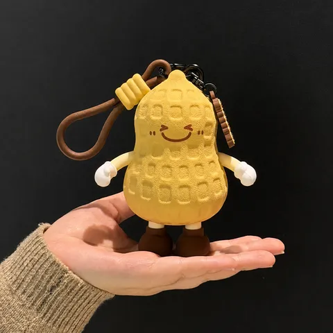Porte-monnaie en Silicone Cacahuète de Dessin Animé Étui de Rangement pour Écouteurs Mini Pochette Avec Crochet Métallique Pendentif de Sac Cacahuète