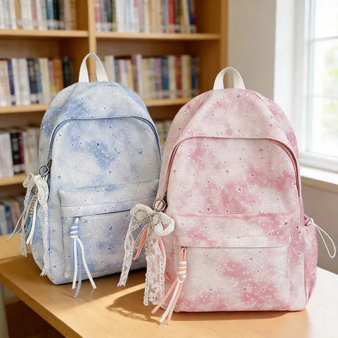 Sac à dos d'école motif étoiles décontracté pour ados Sac de voyage léger avec pendentif