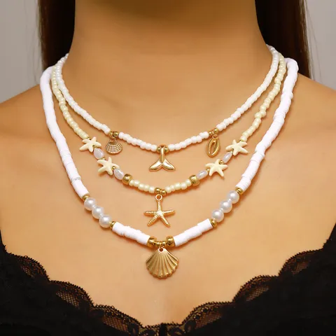 Collana a Strati Stile Resort Bohemien Stella Marina Conchiglia Perla Artificiale per Donna Gioielli con Ciondolo in Lega per Vacanze