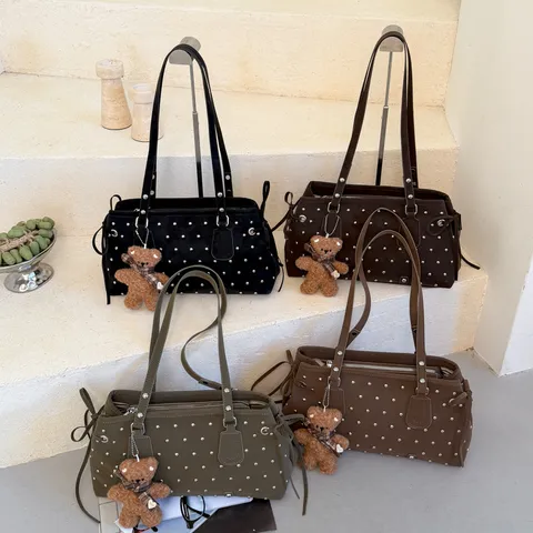 Niche Polka Dot Klinknagel Okseltas Voor Vrouwen Retro PU Lederen Schoudertas Met Zilveren Metalen Noppen En Strik Decoratie Mode Handtas