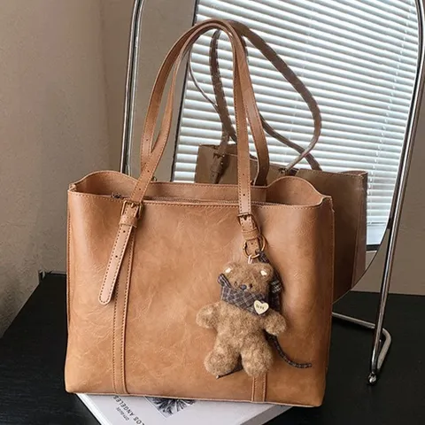 Vintage PU Leren Tote Tas Grote Capaciteit Dames Mode Trendy Bucket Bag Met Beren Hanger Casual Schoudertas Handtas