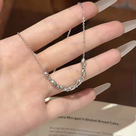 Minimalist Copper Titanium Steel Seven Oval Rice Bead Pendant Necklace For Women Elegant Clavicle Chain Ins Style Jewelry Gift