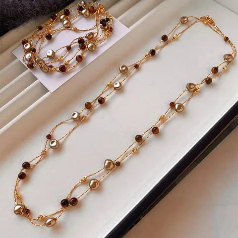 Collana Lunga di Perline in Pietra Occhio di Tigre e Perle Artificiali Stile retrò Maillard Catena da Maglione Multistrato Irregolare per Donna Gioielli Eleganti