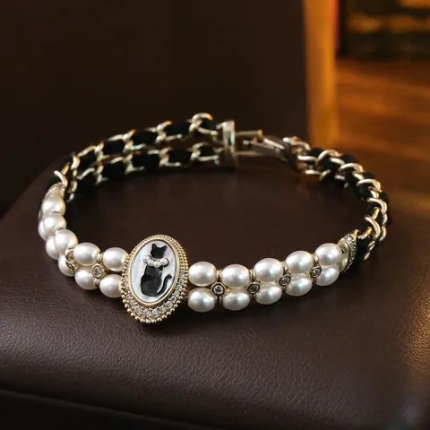 Vintage Französischer Palaststil Schwarze Katze Relief Künstliche Perle Samt Nähte Kupfer Vergoldet Strass Armband Für Damen