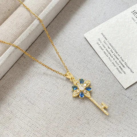 Light Luxury Gold Plated Copper Key Pendant Necklace For Women Exquisite Floral Blue Rhinestone Jewelry Gift