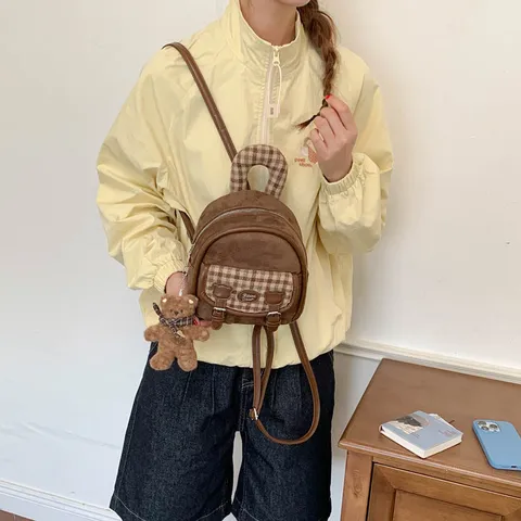 Sac à Dos Preppy Coréen à Carreaux pour Femmes en Cuir PU Vintage Sac d'École Petit Sac à Dos Décontracté Avec Pendentif Ours pour Étudiants
