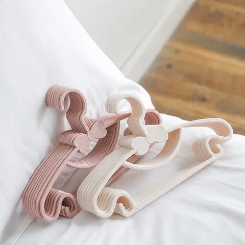 Grucce in Plastica con Fiocco per Bambini Antiscivolo Salvaspazio Appendini per Vestiti da Neonato per Organizzazione Armadio