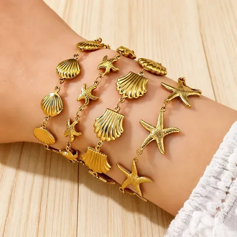 Pulsera de Acero Inoxidable con Estrella de Mar y Concha Hebilla OT para Mujer Estilo Resort Oceánico Bañada en Oro