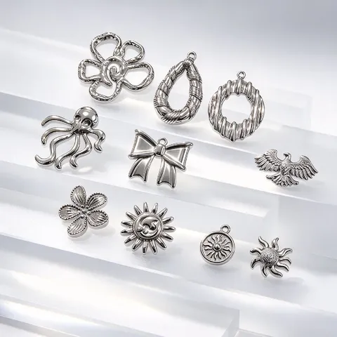 304 Edelstahl Charms Anhänger DIY Schmuckherstellung Zubehör Blume Oktopus Adler Sonne Schleife Wassertropfen Formen Roh Silber Metall Anhänger