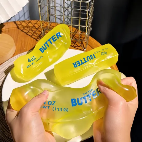 Jouet Squishy en Forme de Bâton de Beurre à Rebond Lent Toucher Doux Humide Anti Stress Fidget Toy pour Adultes Enfants Bureau Fête Décoration Jaune