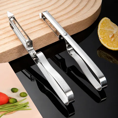 Éplucheur de Cuisine en Acier Inoxydable Grattoir à Fruits et Légumes Éplucheur à Pommes de Terre Avec Design d'Extraction Lame Tranchante Outil Manuel