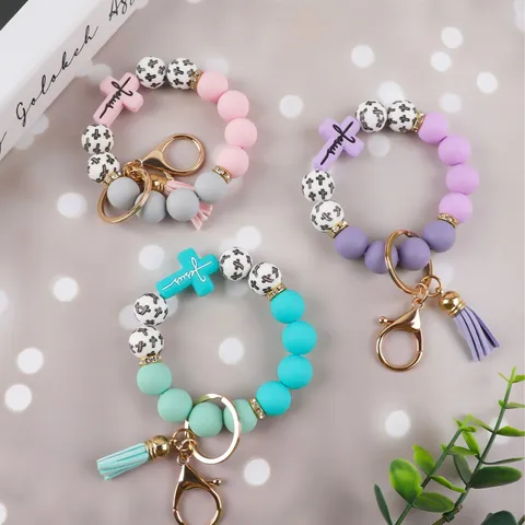 Pulsera Llavero de Cuentas Cruz de Jesús Religiosa para Mujer Hombre Pulsera de Cuentas de Silicona con Borla de PU Cierre de Metal Dorado Regalo de Joyería