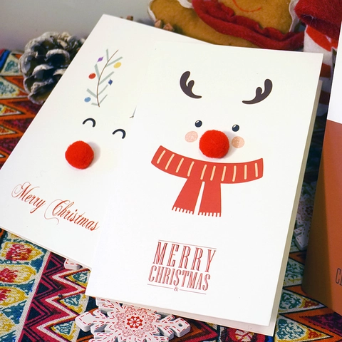 Tarjeta De Felicitación De Navidad Creativa Reno De Dibujos Animados Con Nariz De Pompón Rojo 3D Cartulina Blanca Mensaje