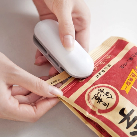 Mini Sigillatrice Termica Portatile Macchina Sigilla Sacchetti Per Alimenti Plastica ABS Gadget Da Cucina Elettronico