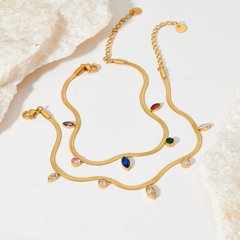 Pulsera De Tobillo Para Mujeres Estilo De Borla De Zirconia Ovalada Súper Brillante Cadena Plana De Acero Inoxidable Joyería De Pie En Oro De Horno