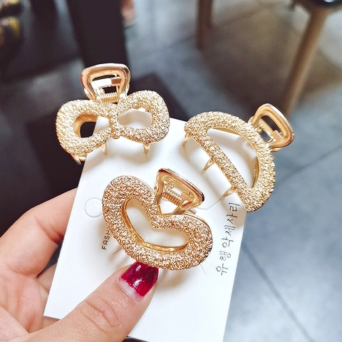Eleganter Goldlegierung Haarklammer Strass Geometrische Herz Schleife Form Haaraccessoires Für Frauen