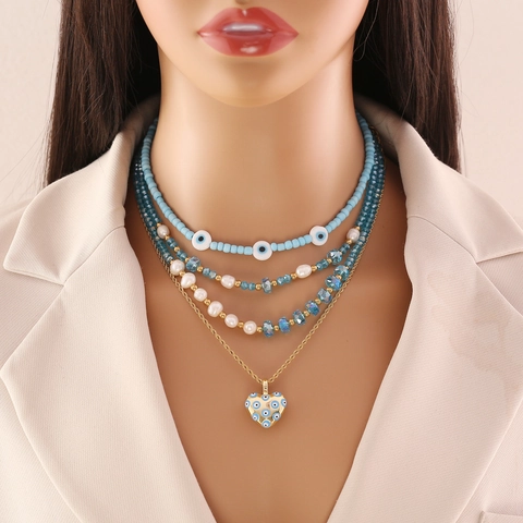Handgefertigte Böser Blick Herz Anhänger Halskette Blaue Künstliche Kristallperlen Weiße Faux Künstliche Perle Mehrlagiger Boho Schmuck