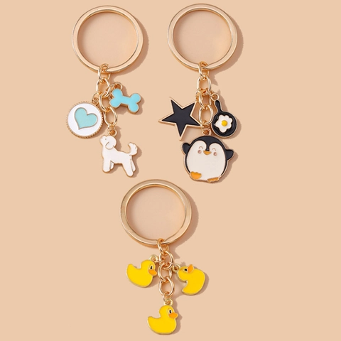 Portachiavi in Metallo Dorato con Animali dei Cartoni Animati Ciondolo Smaltato Creativo Cane Pinguino Anatra Anello Portachiavi per Donna Bambini Regalo Borsa Accessorio