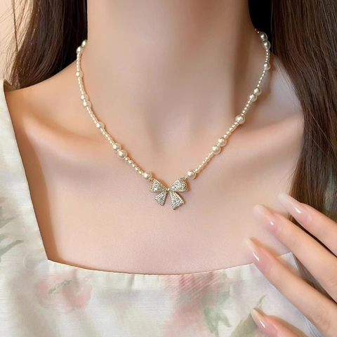 Elegante Collana Di Künstliche Perle Con Ciondolo A Fiocco In Zircone Stile Francese Dolce Catena Da Clavicola Per Donna