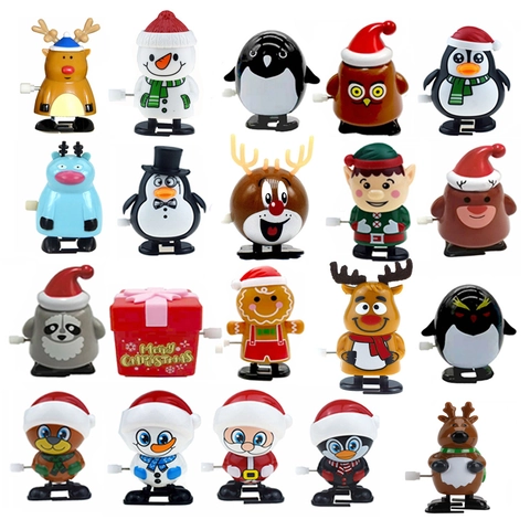 Giocattoli A Molla Di Natale Plastica Camminando Saltando Babbo Natale Pupazzo Di Neve Renna Pinguino Regali Di Festa