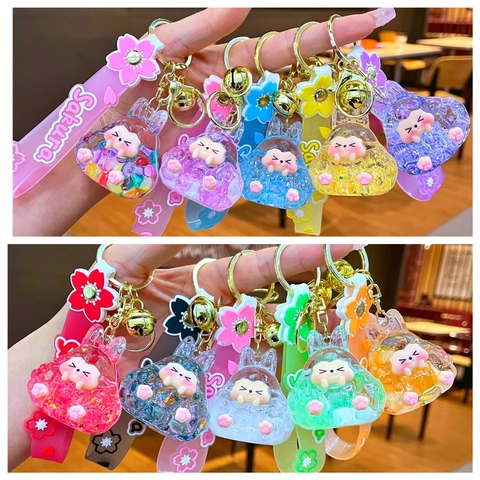 Portachiavi con Sabbia Mobile Luminosa Cartone Animato Animale Bottiglia di Olio Liquido Con Cinturino in Silicone Sakura