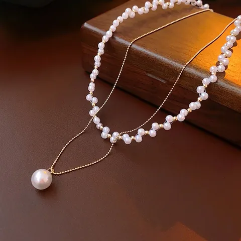 Doppellagige Künstliche Perlenkette Für Damen Mit Großem Rundem Anhänger Und Goldener Legierungskette Französischer Retro Eleganter Stil
