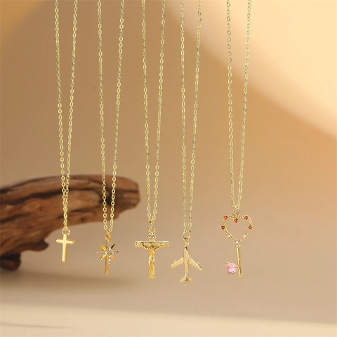 Collana Con Ciondolo Minimalista In Rame Placcato Oro Zircone Croce Stella Cuore Chiave Aereo Gioielli Di Moda Per Donna