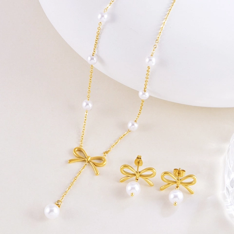 Collana E Orecchini Con Fiocco Elegante Acciaio Inossidabile Placcato Oro Perla Artificial Sintetica Nappa Per Donna