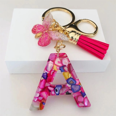 Portachiavi con Lettere dell'Alfabeto in Resina Moda con Nappa a Farfalla Rosa Lega Oro Ciondolo per Borsa Donna Ornamento