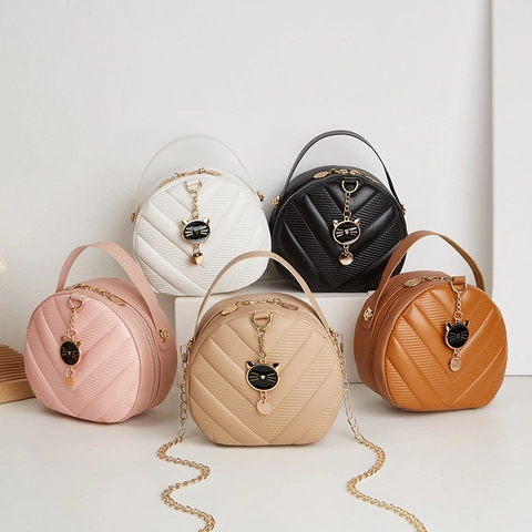 Sac Bandoulière Rond Femmes Cuir PU Matelassé En V Mini Sac À Main Avec Pendentif Chat Chaîne Métallique Casual