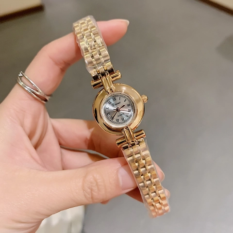 Reloj De Cuarzo Para Mujer Correa De Acero De Aleación Esfera Redonda Números Romanos Elegante Retro Resistente Al Agua