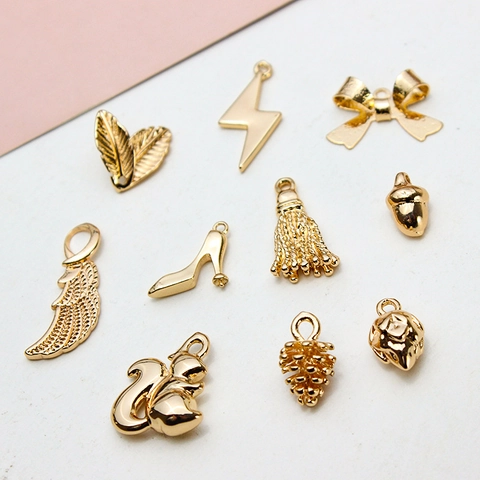 Ciondoli In Rame Dorato DIY Pigna Piuma Foglia Fiocco Nappa Per Creazione Di Gioielli Bracciale Collana Accessorio