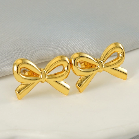 Orecchini A Lobo Con Fiocco Eleganti Acciaio Inossidabile Lucidato Placcato Oro 18K Design Di Nicchia Gioielli Da Donna