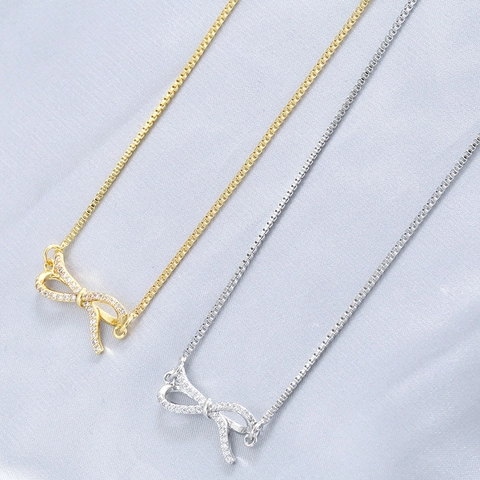 Elegante Collana con Ciondolo a Fiocco in Rame per Donna Stile Giapponese Coreano Placcato Oro Argento Intarsio di Zirconia