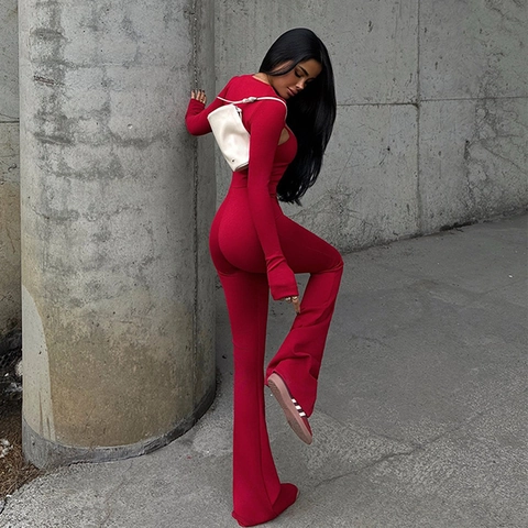Hollow Out Lange Mouwen Shrug En Halter Uitlopende Jumpsuit Polyester Geribbelde Slim Fit Rugloos Streetwear Voor Dames