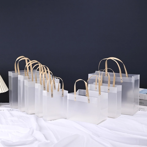Frosted Translucent Gift Bag With Wood Grain Handles And Rivet Waterproof Plastic Tote For Wedding Party Favors