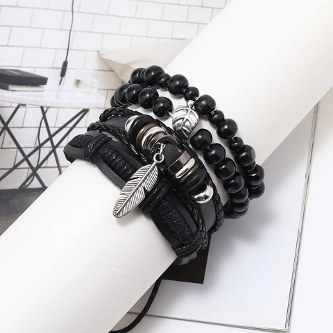 Set di Bracciali in Pelle Multistrato da Uomo Retro Piuma Foglia Pendente Perline di Legno Regolabile Intrecciato Stile Punk Gioielli