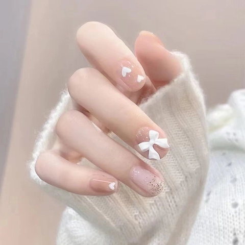 Faux Ongles Courts French Press On Nails Blanc Nœud 3D Cœur Paillettes Argentées Dégradé Nude Rose Style Doux Pour Femmes
