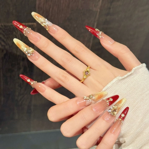 Uñas Postizas Hechas a Mano Largas Stiletto Rojo Champagne Oro Brillo Ojo de Gato Strass Mariposa Decoración Lujo Juego
