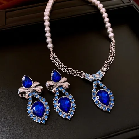 Set Gioielli Lusso Cristallo Goccia Blu Per Donne Con Fiocco Collana Künstliche Perle E Orecchini Perno In Argento Vintage