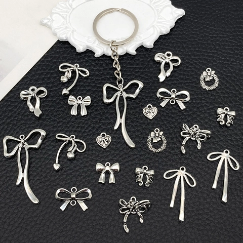 Lazo Corazón DIY Dijes Colgantes Aleación De Zinc Hueco Lindo Para Collar Pulsera Pendiente Joyería Plata Antigua