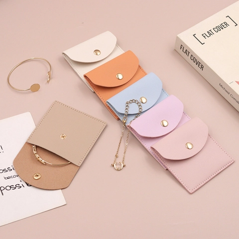 Pochette De Rangement Pour Bijoux En Cuir PU Portable Avec Bouton Pression En Métal Pour Boucles D'oreilles Bagues Colliers Mini Organisateur De Voyage