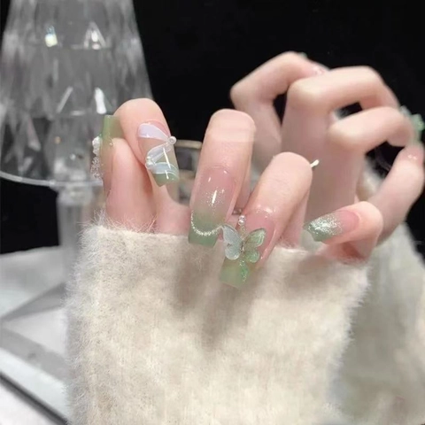 Elegante Künstliche Nägel Französischer Stil Lang Sargform Grün Cat Eye Mit Kamelie Schmetterling Schleife Künstliche Perle ABS Kunststoff
